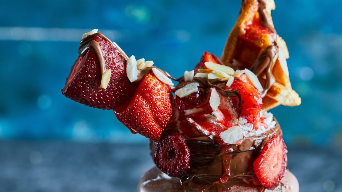 A well decorated frozen dessert showcasing dessert decoration skills