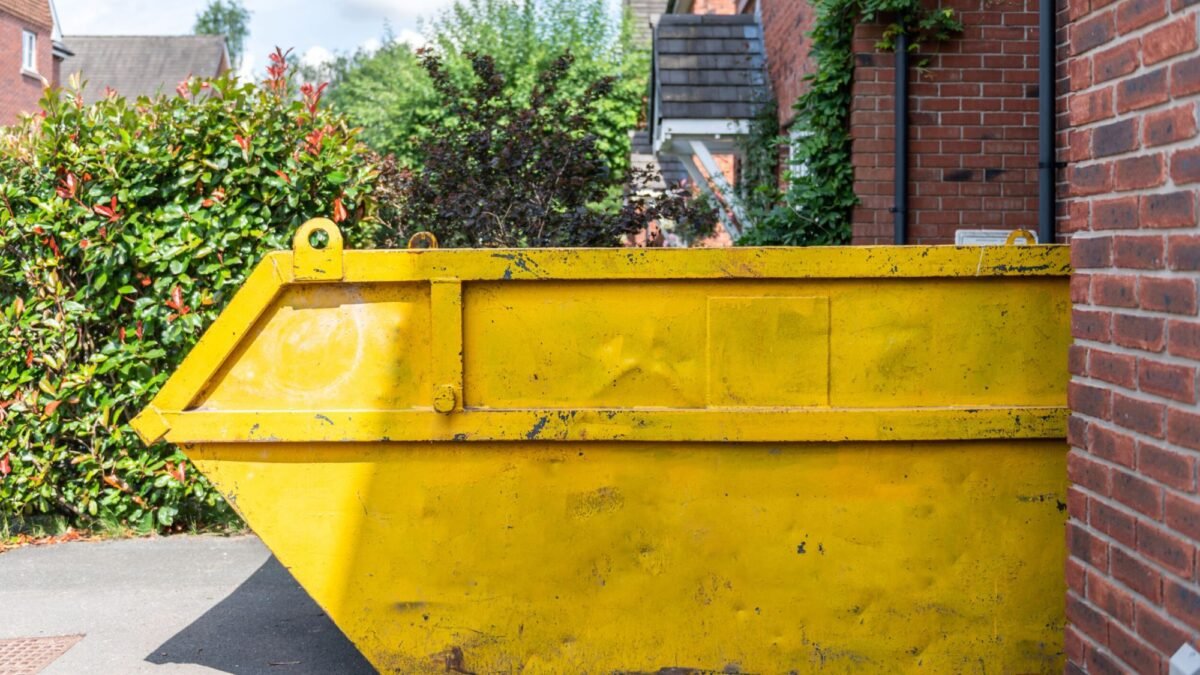 Yellow colour large bins placed infront of a private property